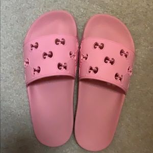Authentic GUCCI rubber GG slide sandal.
